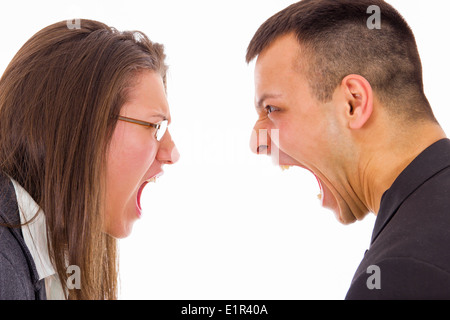 young couple fighting and yelling on each other face to face Stock Photo