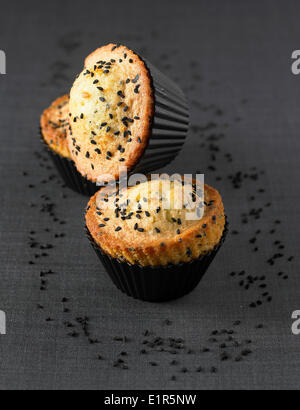 Black sesame seed and candied orange muffins Stock Photo