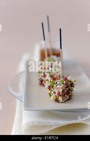 Foie gras,almond,raw ham and pistachio bites Stock Photo