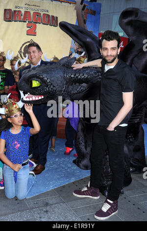 Actors Jonah Hill and Jay Baruchel attend the 'How To Train Your Dragon 2' Photo Call in Times Square on June 6, 2014 in New York City Stock Photo