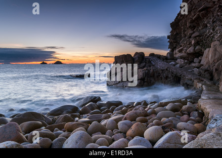 Path over rocks at Porth Nanven Cove near Lands End in Cornwall Stock Photo