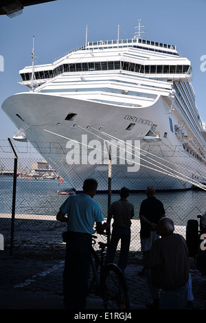 People watching the Costa Pacifica, sister ship of Costa Concordia, docked in the port of Thessaloniki, Greece 2013 Stock Photo