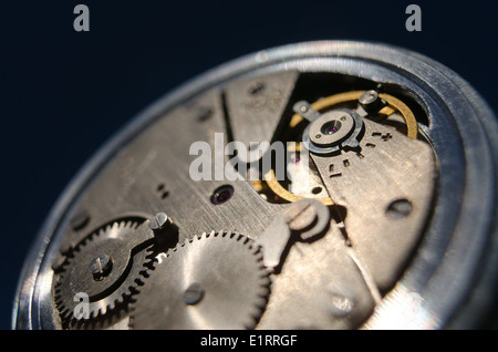 old silver chrome stopwatch chronological timer jewels accurate back dial buttons inside cogs and wheels with an escapement Stock Photo