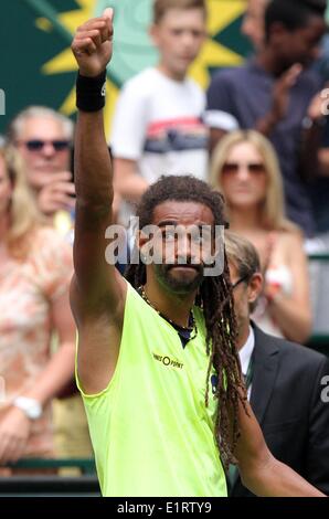 German tennis player Dustin Brown gestures after the match against Russian tennis player Kuznetsov at the ATP tournament in Halle (Westphalia), Germany, 09 June 2014. Photo: OLIVER KRATO/DPA Stock Photo