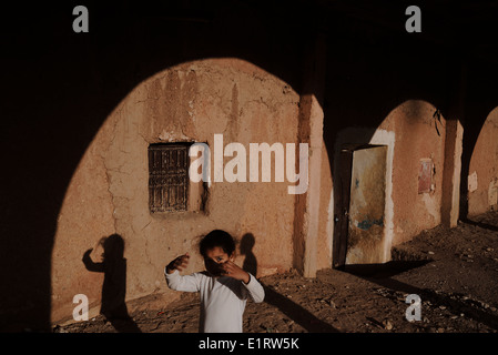 Kids playing in the old city of Ouarzazate, Morocco Stock Photo