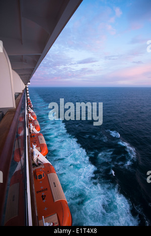 Abstract view along the side of MV Arcadia in the early evening light whilst she sails in the North Sea Stock Photo