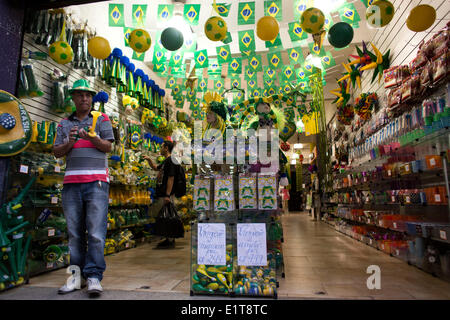 Sao Paulo, Brazil. 9th June, 2014. A man sells souvenirs in downtown Sao Paulo, Brazil, on June 9, 2014. The 2014 FIFA World Cup will be held in Brazil from June 12 to July 13. Credit:  Guillermo Arias/Xinhua/Alamy Live News Stock Photo