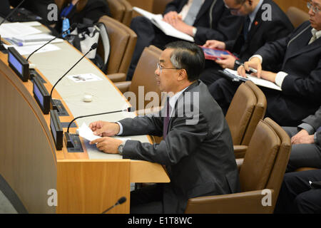 UN headquarters in New York, USA. 9th June, 2014. Wang Min, China's deputy permanent representative to the United Nations, speaks during a meeting to commemorate the 20th anniversary of the enforcement of the UN Convention on the Law of the Sea, at the UN headquarters in New York, USA. on June 9, 2014. The Chinese envoy on Monday called for a harmonious maritime order, saying that maritime disputes should be settled through negotiation between the parties directly involved. Credit:  Niu Xiaolei/Xinhua/Alamy Live News Stock Photo