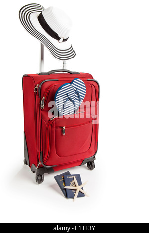 Picture of Red Suitcase Ready for Travel To Beach Vacation with Sandals Stock Photo