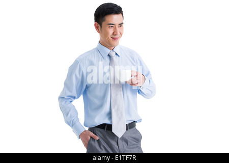 Businessman taking coffee break Stock Photo