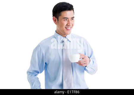 Businessman taking coffee break Stock Photo