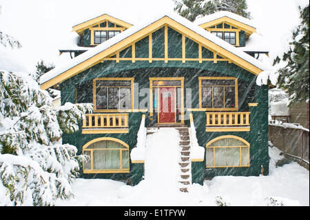 House in a snow storm, North Vancouver,  British Columbia, Canada Stock Photo