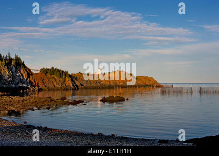 Weir net in front of Swallowtail Lighthouse, Grand Manan Island, Bay of Fundy, New Brunswick, Canada Stock Photo