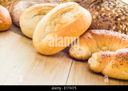 Different bakery products including bread rolls with grain Stock Photo