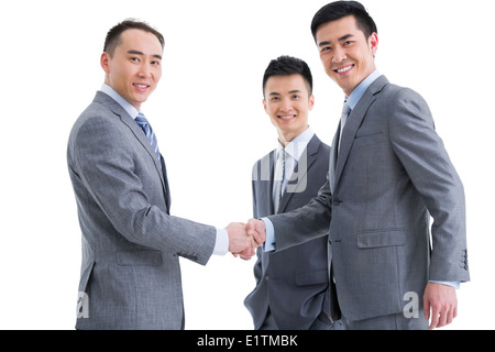 Business persons shaking hands Stock Photo