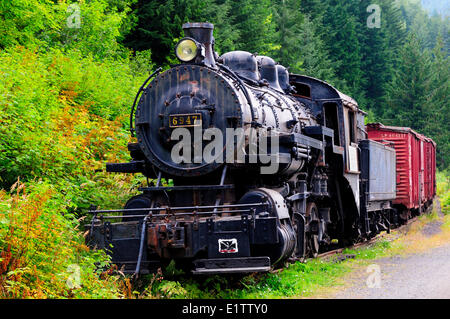 Canadian Pacific Rail's old steam locomotive #6947 and vintage freight train in the ghost town, Sandon, BC. Stock Photo