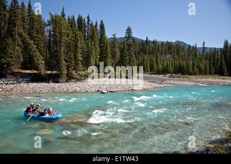 Family enjoy raft trip on Kootenay River, Kootenay National Park, BC, Canada. Stock Photo