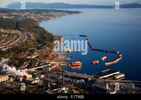 Aerial, Pulp Mill, Chip Barges, Hulks Breakwater Ships, Westview and Powell River, British Columbia, Canada Stock Photo