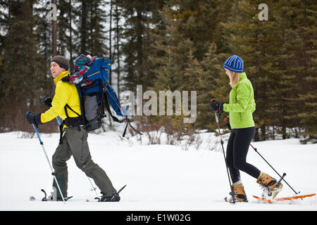 A young outdoorsy family going for a snowshoe at Peter Lougheed Provincial Park,  Kananaskis, AB Stock Photo