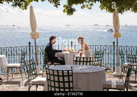 Italy, Liguria, Santa Margherita Ligure, Wedding at Imperiale Palace Hotel. Spuses drinking on the terrace Stock Photo