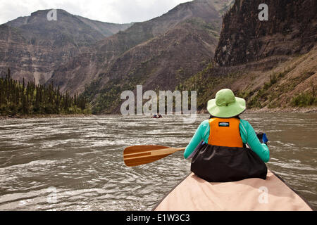Two canoes in third canyon on Nahanni River, Nahanni National Park Preserve, NWT, Canada. Stock Photo