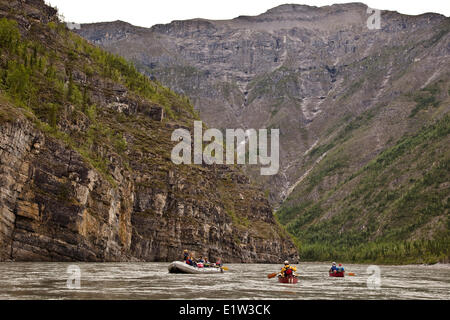 Two canoes and raft on Nahanni River, Nahanni National Park Preserve, NWT, Canada. Stock Photo