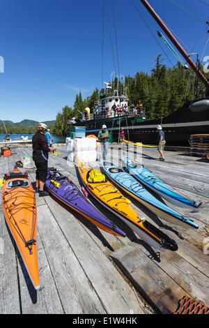 The Uchuck 111 deposits a group of kayakers at Port Eliza on the British Columbia coast of Canada.No Release Stock Photo