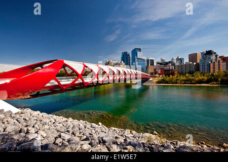 Calgary Peace Bridge downtown highrise buildings (Peace Bridge is a pedestrian bridge designed by renowned Spanish architect