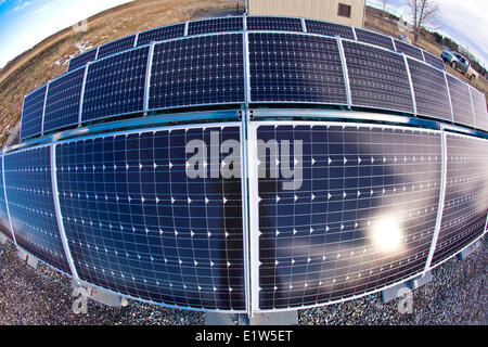 Solar panels  at water treatment plant in Turner Valley, Alberta, Canada. Stock Photo