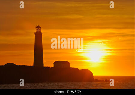 Cap des Rosiers lighthouse,  Quebec, Canada at sunset Stock Photo