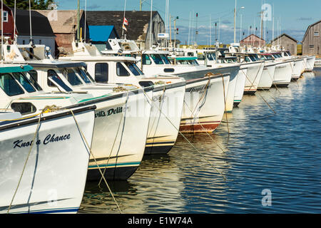 Fishing boats docked at Malpeque Harbour, Prince Edward Island, Canada Stock Photo