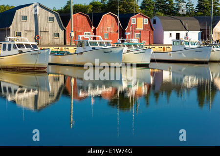 Fishing boats docked at Malpeque Harbour, Prince Edward Island, Canada Stock Photo