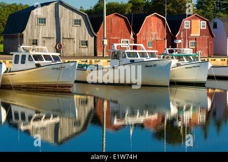 Fishing boats docked at Malpeque Harbour, Prince Edward Island, Canada Stock Photo