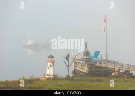 Wharf in fog, Walters Cove, LaHave River, Lunenburg County, Nova Scotia, Canada Stock Photo