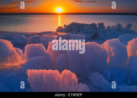 Ice on Lake Winnipeg in spring at sunrise, Winnipeg Beach, Manitoba, Canada Stock Photo
