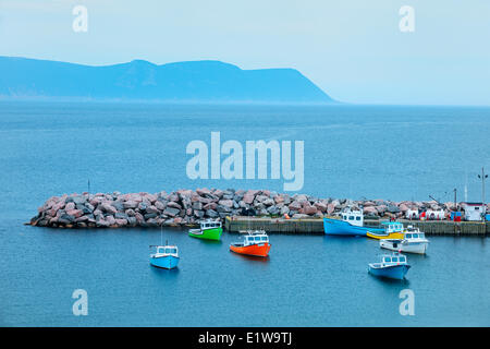 Fishing boats in harbour on Cape Breton Island, White Point, Nova Scotia, Canada Stock Photo