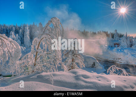 Fog and trees covered with hoarfrost on the Grass River, Pisew Falls, Pisew Falls Provincial Park, Manitoba, Canada Stock Photo