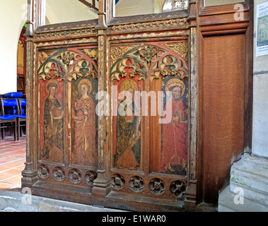 A view of the rood screen on the south side of the entrance to the chancel at Trimingham parish church, Norfolk, England, UK. Stock Photo