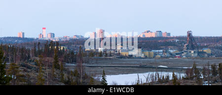 The abandoned Giant Mine, with the city of Yellowknife in the background.  Yellowknife, Northwest Territories, Canada. Stock Photo