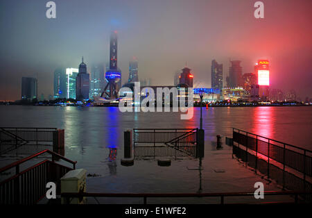 Oriental Pearl TV tower and Pudong skyline at rainy night, Shanghai, China Stock Photo