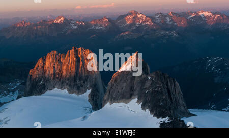 Bugaboo, Snowpatch and Pigeon Spires alit in alpenglow, Bugaboo Alpine Provincial Park, British Columbia Stock Photo
