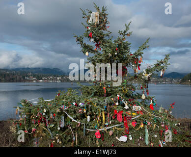 Community Christmas Tree decorated at Whiffin Spit Beach, part of Quimper Park in Sooke, British Columbia, Canada