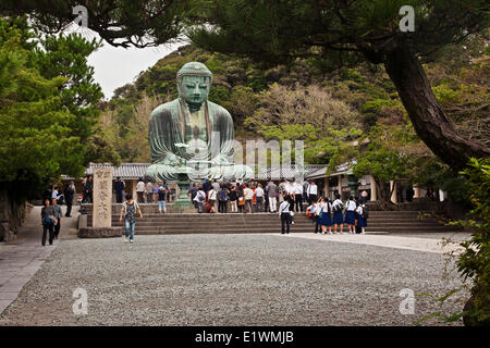 Located on the grounds of the Kotokuin Temple, the Great Buddha (Daibutsu) of Kamakura stands 13.35 meters tall and is the secon Stock Photo