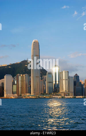 Sunlight reflecting on a skyscraper in Hong Kong. Victoria Peak and International Finance Centre tower Stock Photo