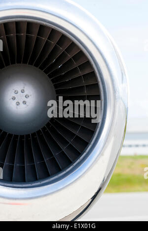 A close up the turbofan on a jet engine on a Westjet 737 on the tarmac at YQQ.  Comox The Comox Valley Vancouver Island British Stock Photo