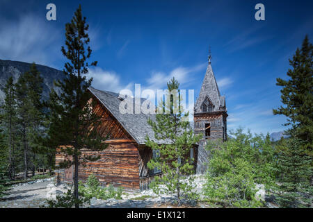 St. Andrews Presbyterian Church in Bennett, British Columbia. A Canadian historical site. Bennett lake is seen in the distance. Stock Photo