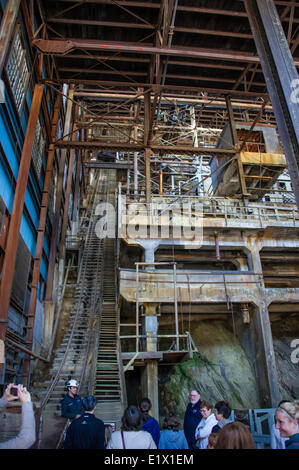 Tourists taking a tour through the Britannia Mine in Sqamish, British Columbia, Canada Stock Photo