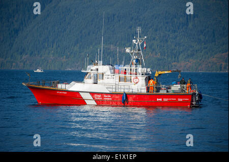 Canadian Coast Guard boat floating in Howe Sound, British Columbia, Canada Stock Photo