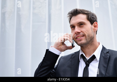 Businessman using cell phone Stock Photo