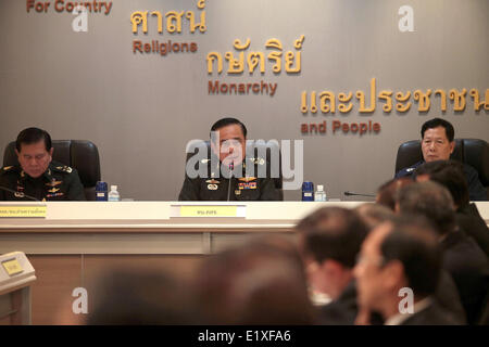 Bangkok, Thailand. 11th June, 2014. Prayuth Chan-ocha (C), Chief Gen. of the National Council for Peace and Order (NCPO), speaks at the meeting of NCPO with Thai ambassadors at Royal Thai Army head quarter in Bangkok, Thailand, June 11, 2014. © Pool Photo by Thai Army/Xinhua/Alamy Live News Stock Photo